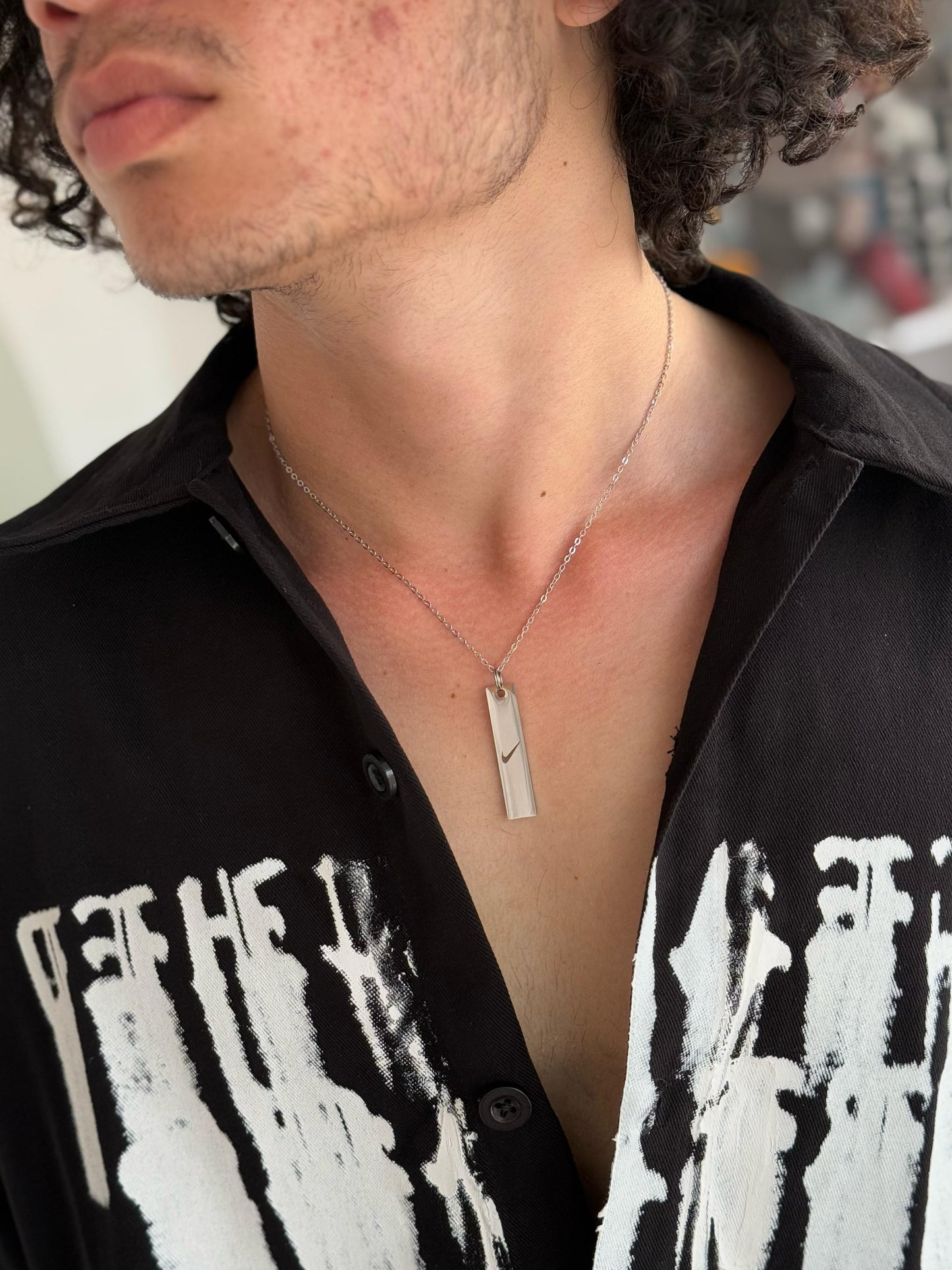Swoosh Steel Pendant – Silver