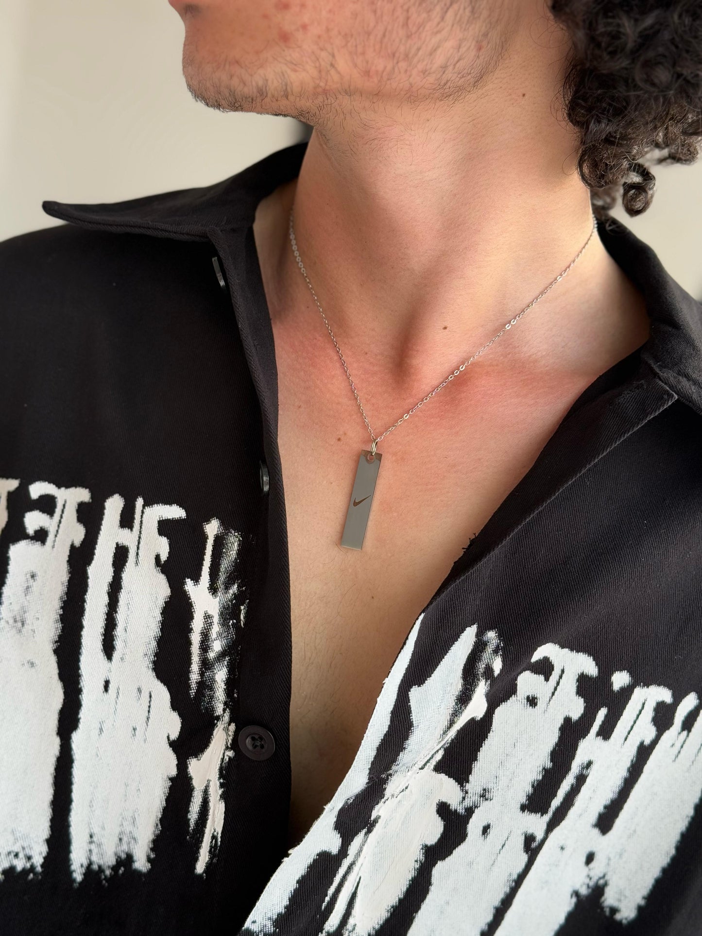 Swoosh Steel Pendant – Silver